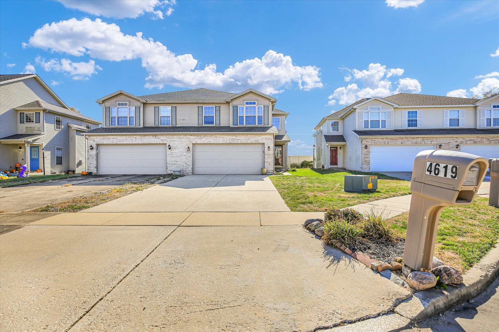 4619 Copper Ridge Road Champaign, IL 61822 - Photo 2 of 29 a view of a house with a yard