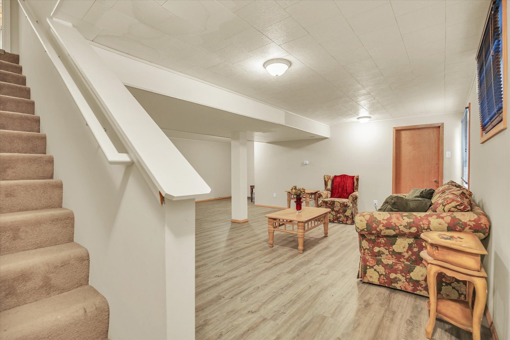 4619 Copper Ridge Road Champaign, IL 61822 - Photo 24 of 29 a living room with furniture and wooden floor