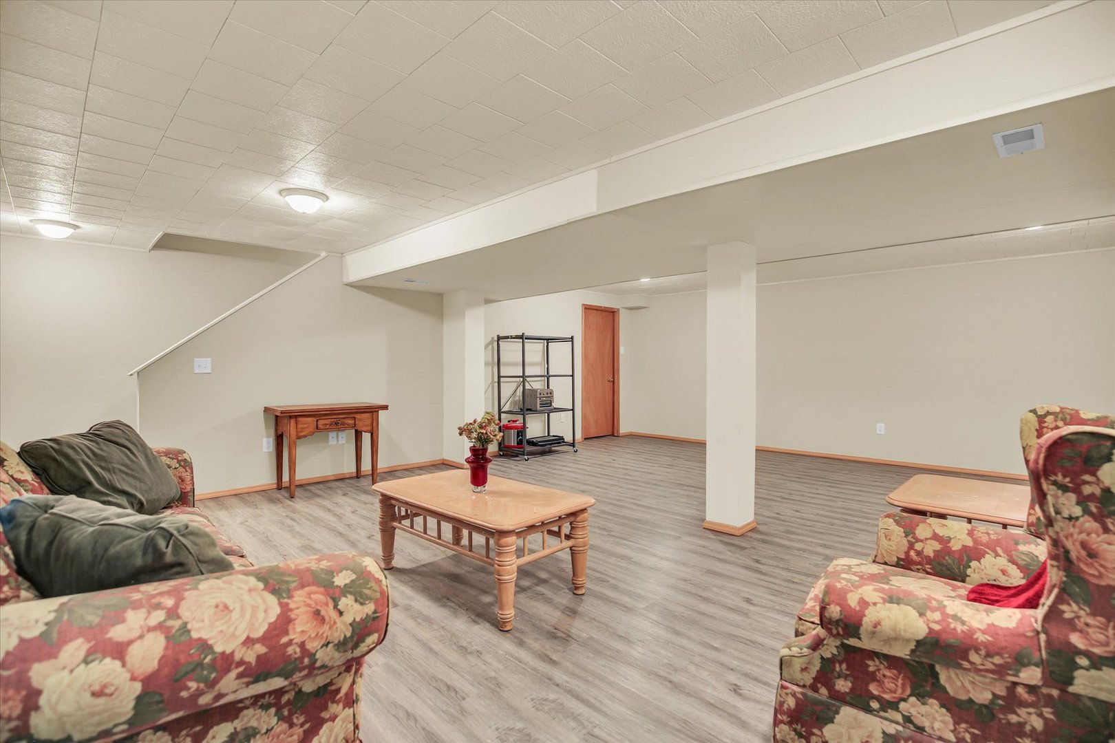 4619 Copper Ridge Road Champaign, IL 61822 - Photo 25 of 29 a living room with furniture and wooden floor