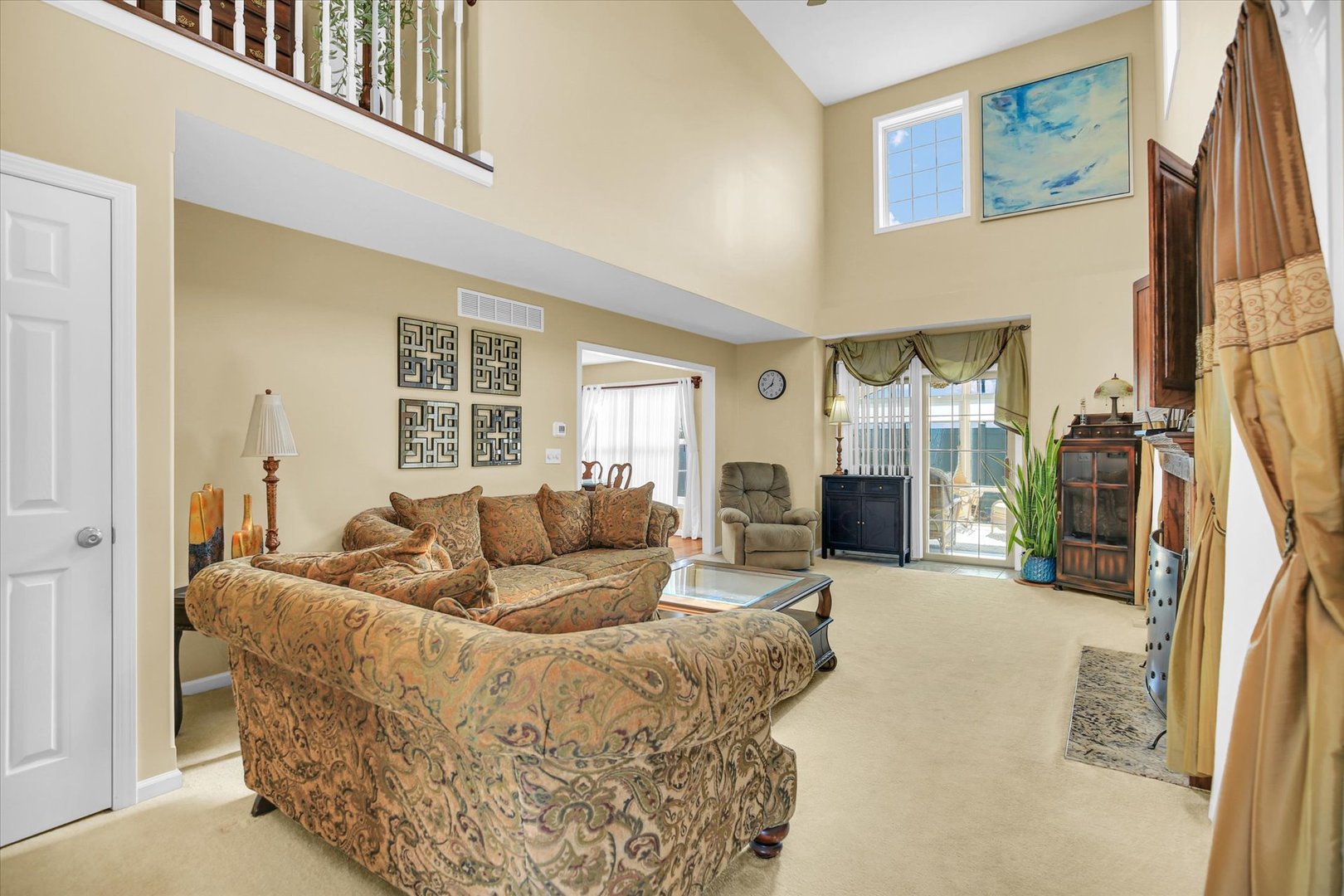 4619 Copper Ridge Road Champaign, IL 61822 - Photo 5 of 29 a living room with furniture and a fireplace