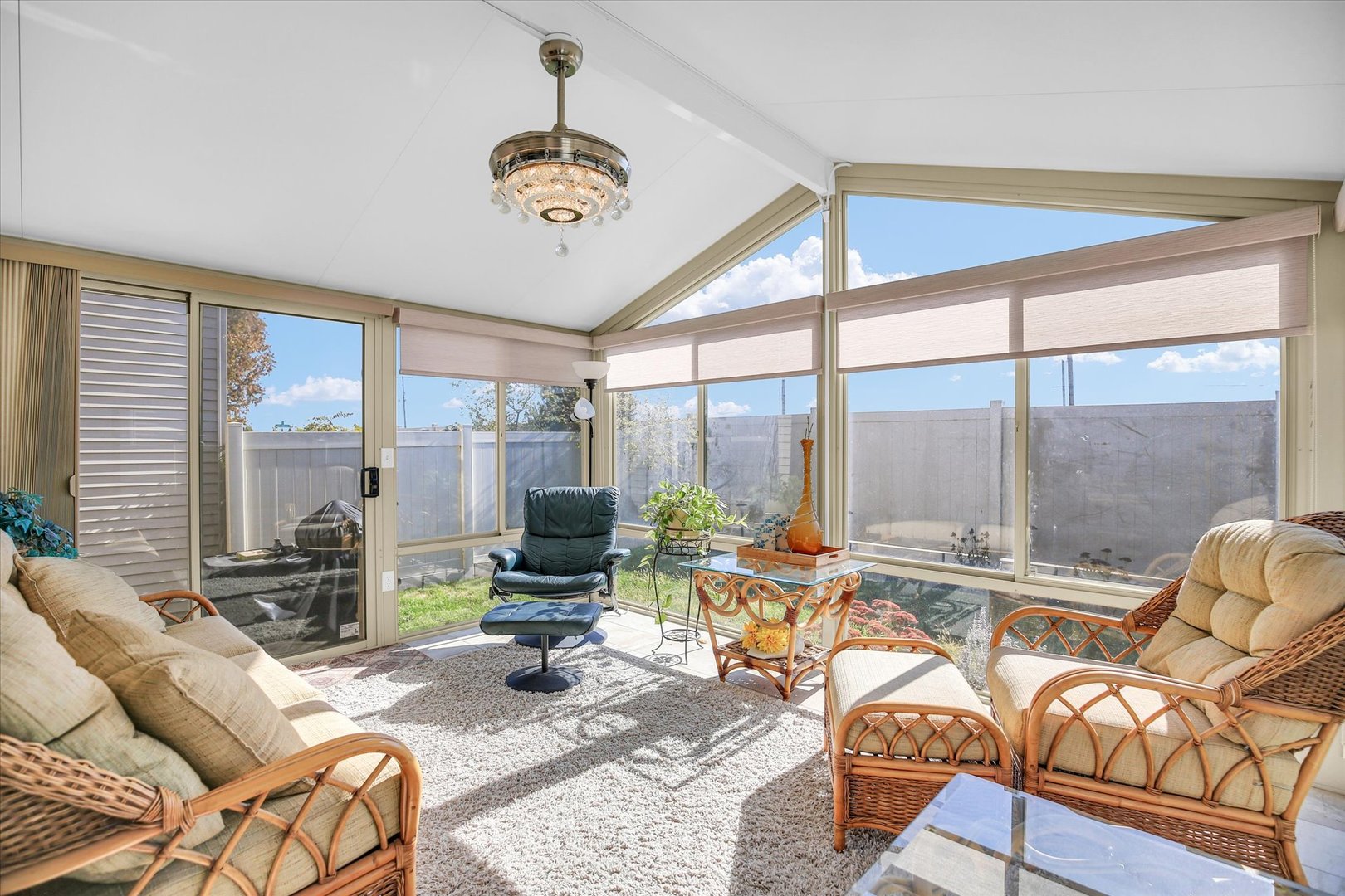 4619 Copper Ridge Road Champaign, IL 61822 - Photo 9 of 29 a living room with furniture and floor to ceiling windows
