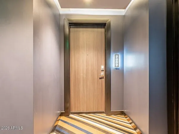 a view of bedroom with wooden floor