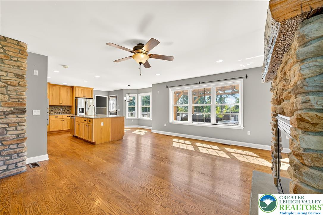 202 Cherry Court Nazareth, PA 18064 - Photo 13 of 43 a view of a kitchen with kitchen island wooden floors and stainless steel appliances