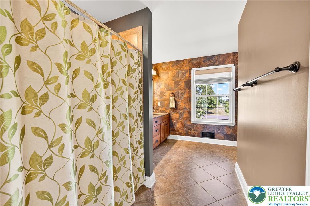 202 Cherry Court Nazareth, PA 18064 - Photo 30 of 43 a bathroom with a bathtub and shower