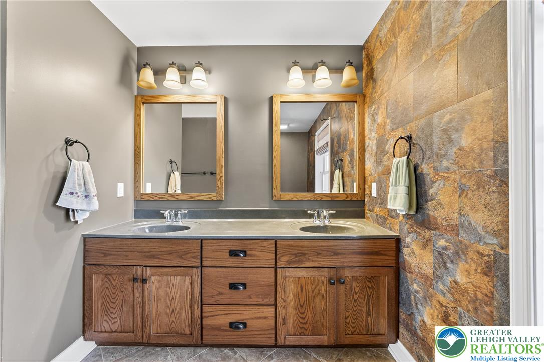 202 Cherry Court Nazareth, PA 18064 - Photo 32 of 43 a bathroom with a double vanity sink mirror and