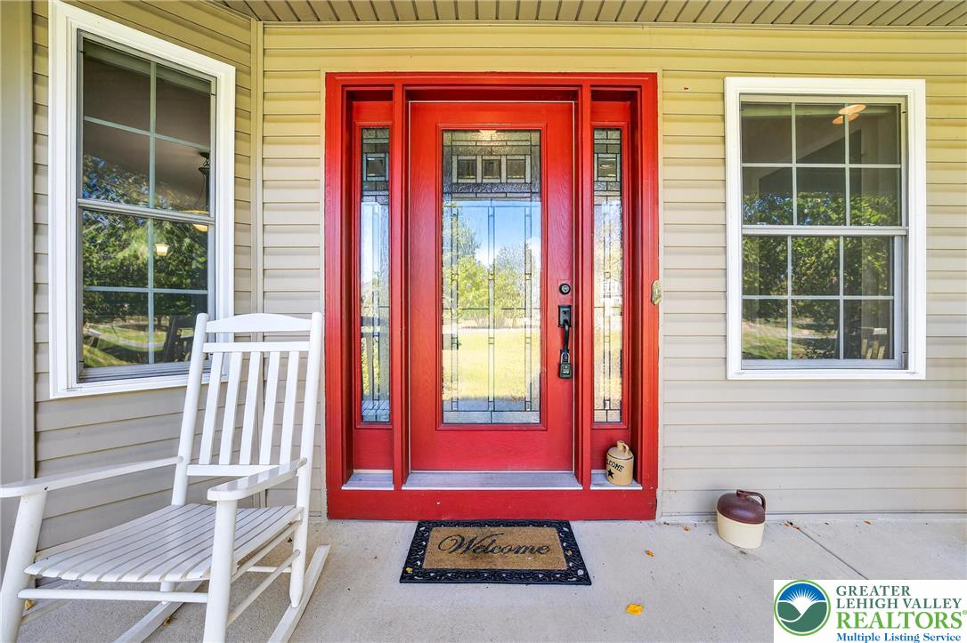 202 Cherry Court Nazareth, PA 18064 - Photo 5 of 43 a front view of a house with a yard