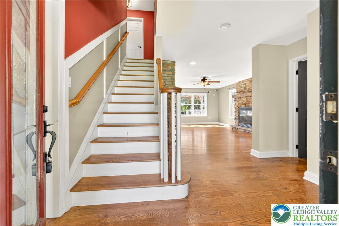 202 Cherry Court Nazareth, PA 18064 - Photo 6 of 43 a view of entryway and hall with wooden floor
