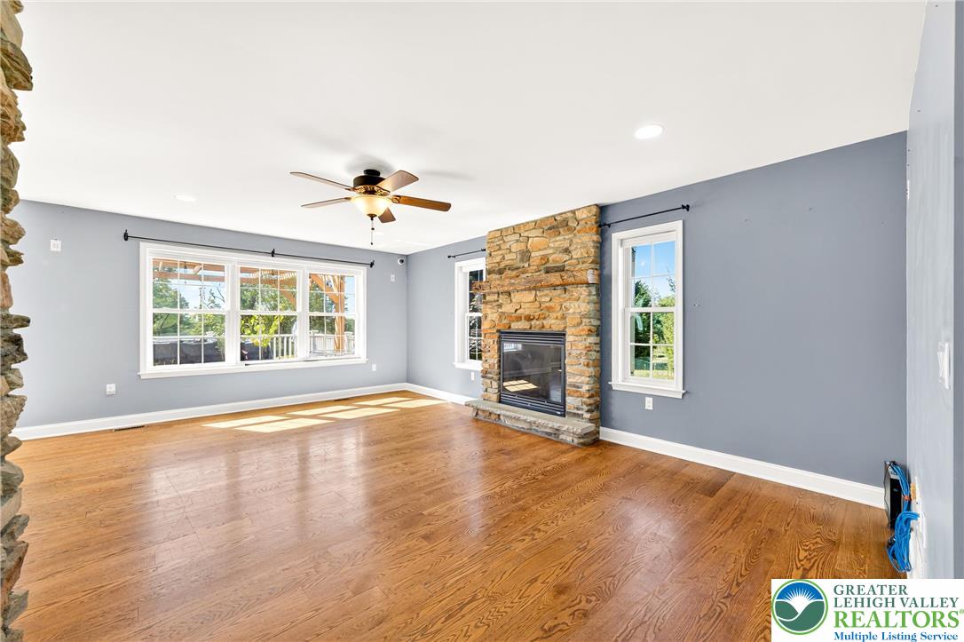 202 Cherry Court Nazareth, PA 18064 - Photo 9 of 43 wooden floor in an empty room with a window