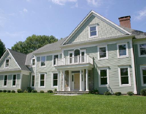 2 Golden Farm Road, Unit 2 Stamford, CT 06903 - Photo 1 of 1 a front view of a house with a yard