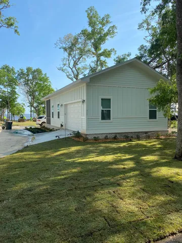 a house view with a outdoor space
