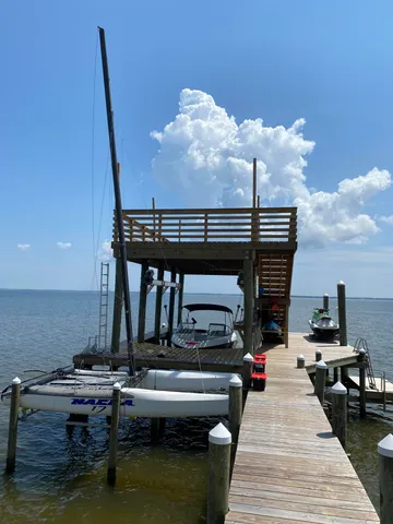 a view of swimming pool with seating space