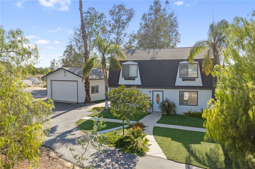 35825 Meadow Ridge Road Temecula, CA 92592 - Photo 23 of 75 front view of house with a yard