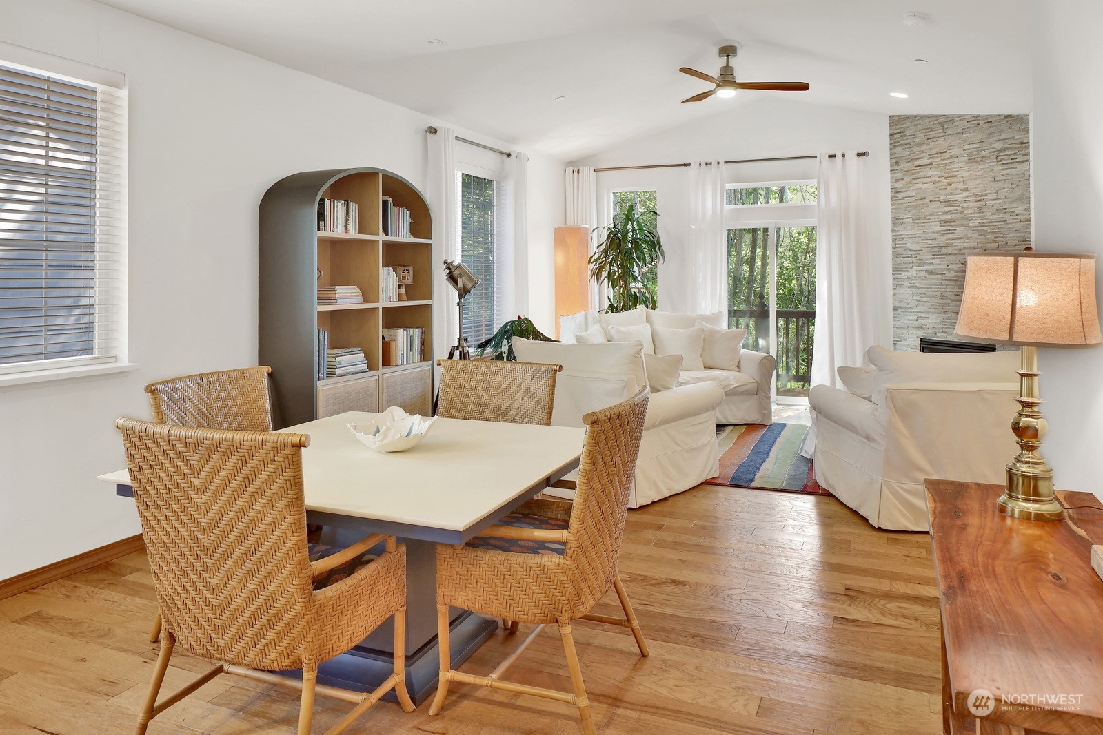 734 Fuchsia Loop Bellingham, WA 98226 - Photo 12 of 27 a view of a dining room with furniture wooden floor and a rug