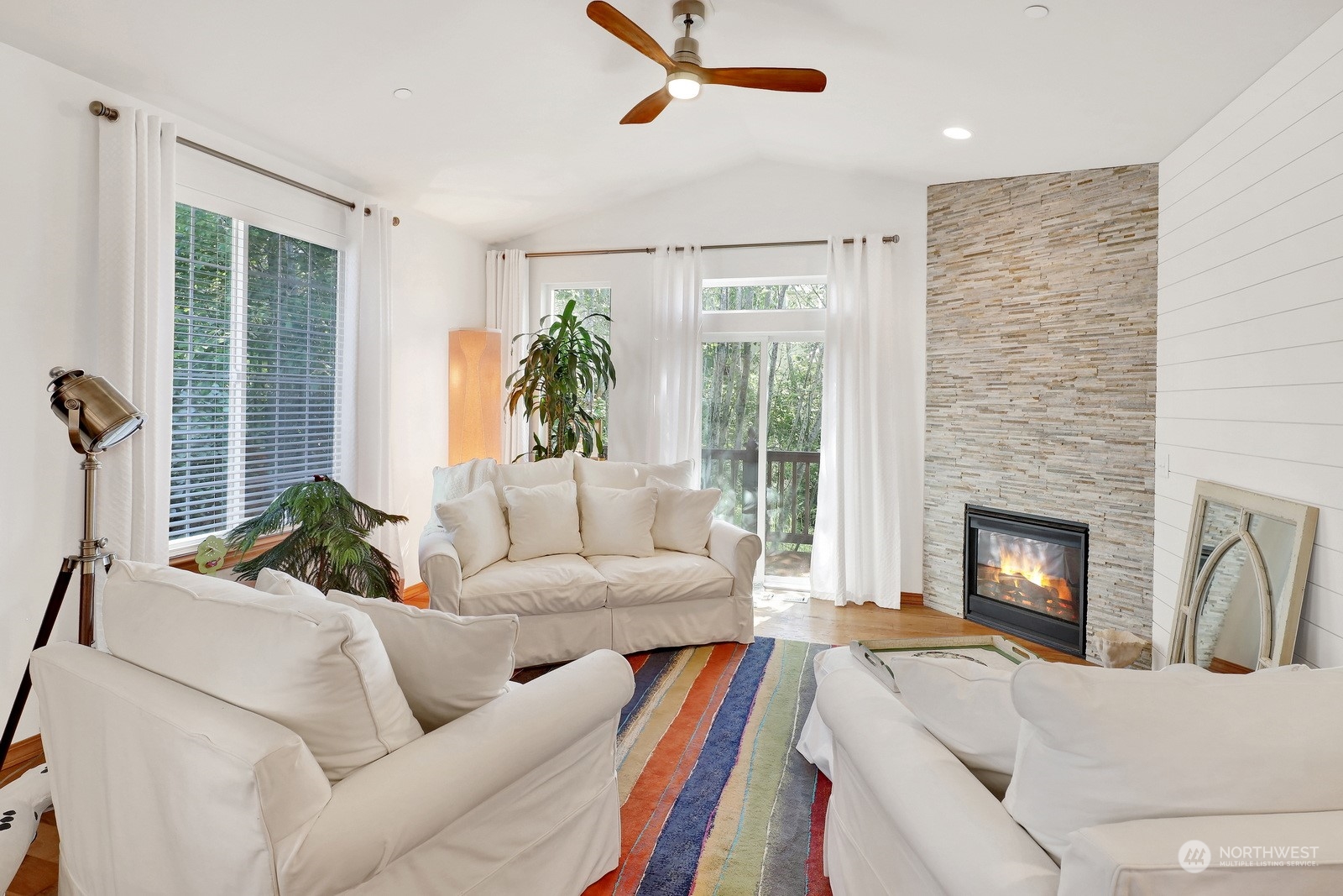 734 Fuchsia Loop Bellingham, WA 98226 - Photo 14 of 27 a living room with furniture fireplace and flat screen tv