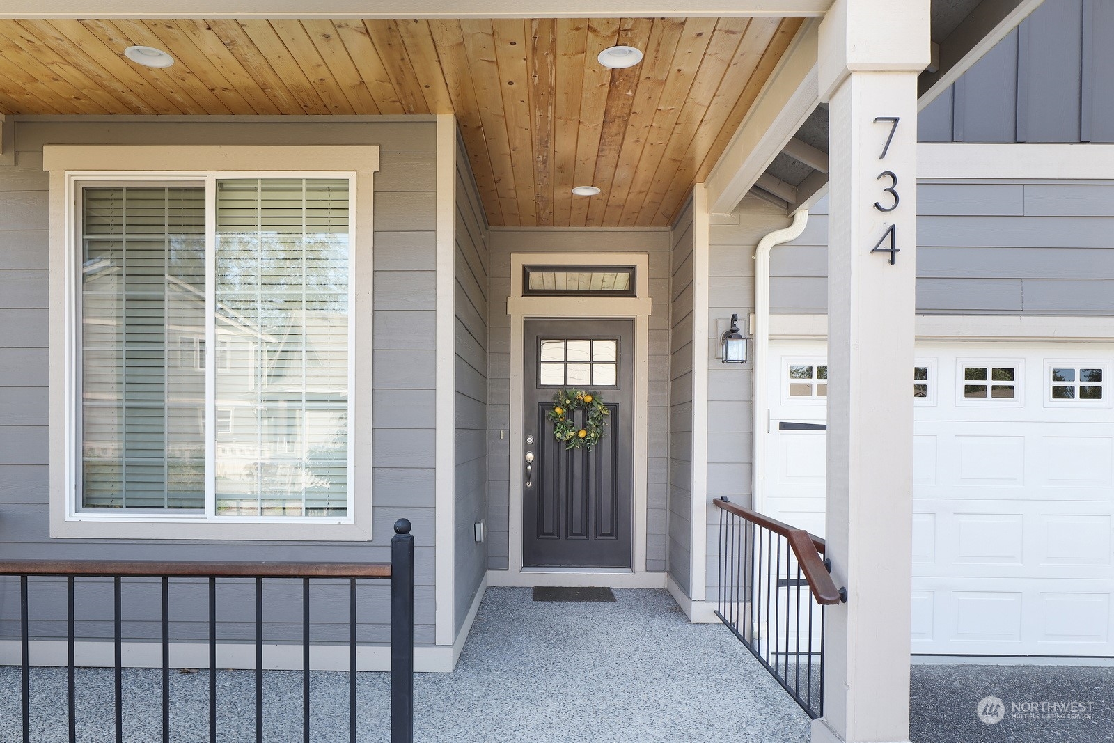 734 Fuchsia Loop Bellingham, WA 98226 - Photo 2 of 27 a view of a hallway with wooden floor and entryway