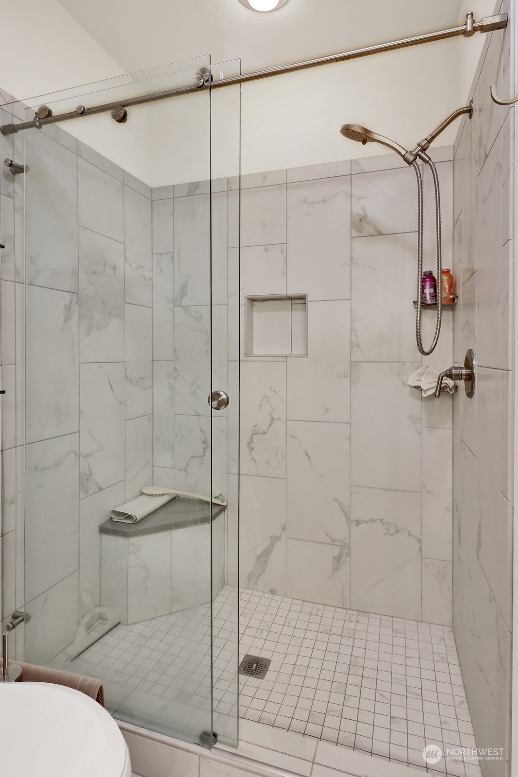 734 Fuchsia Loop Bellingham, WA 98226 - Photo 24 of 27 a bathroom with a shower and toilet