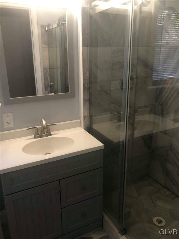 2121 Mountain Road Slatington, PA 18080 - Photo 45 of 45 a bathroom with a sink and mirror