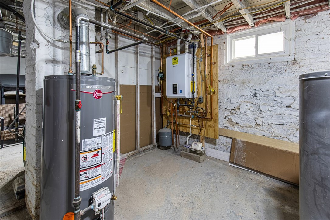 104 Tell Street Providence, RI 02909 - Photo 40 of 47 Unit 1 Combo High Efficiency Heater+Hot Water and Unit 2 Hot Water Tank