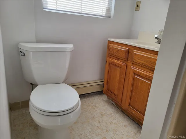 a bathroom with a toilet