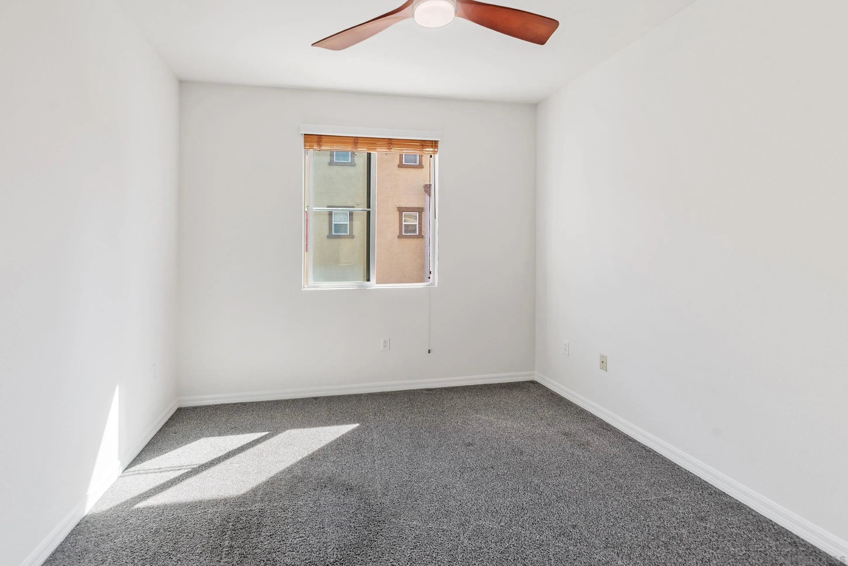 2185 Caminito Rinaldo, Unit 118 Chula Vista, CA 91915 - Photo 21 of 38 an empty room with a window