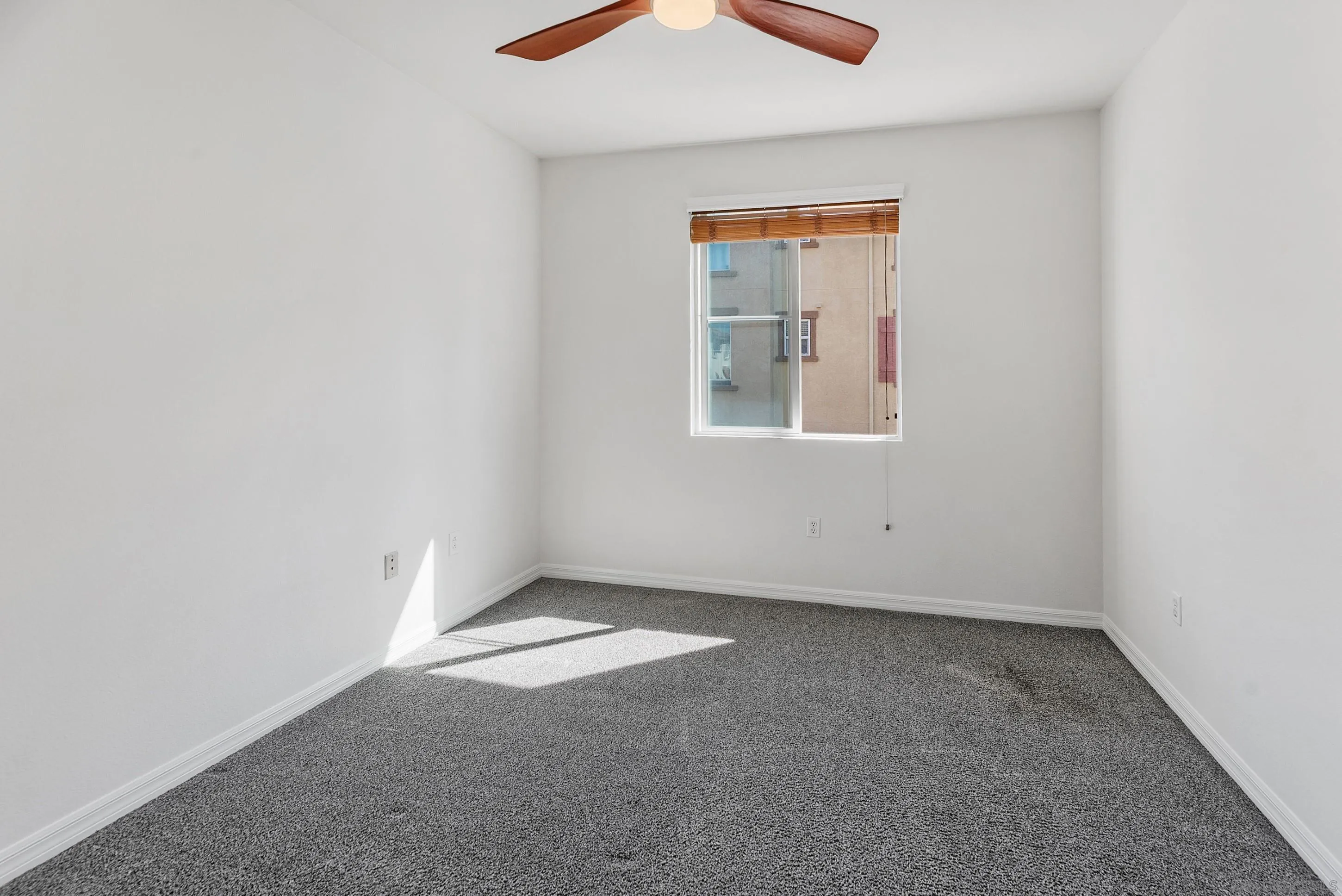 2185 Caminito Rinaldo, Unit 118 Chula Vista, CA 91915 - Photo 23 of 38 an empty room with windows