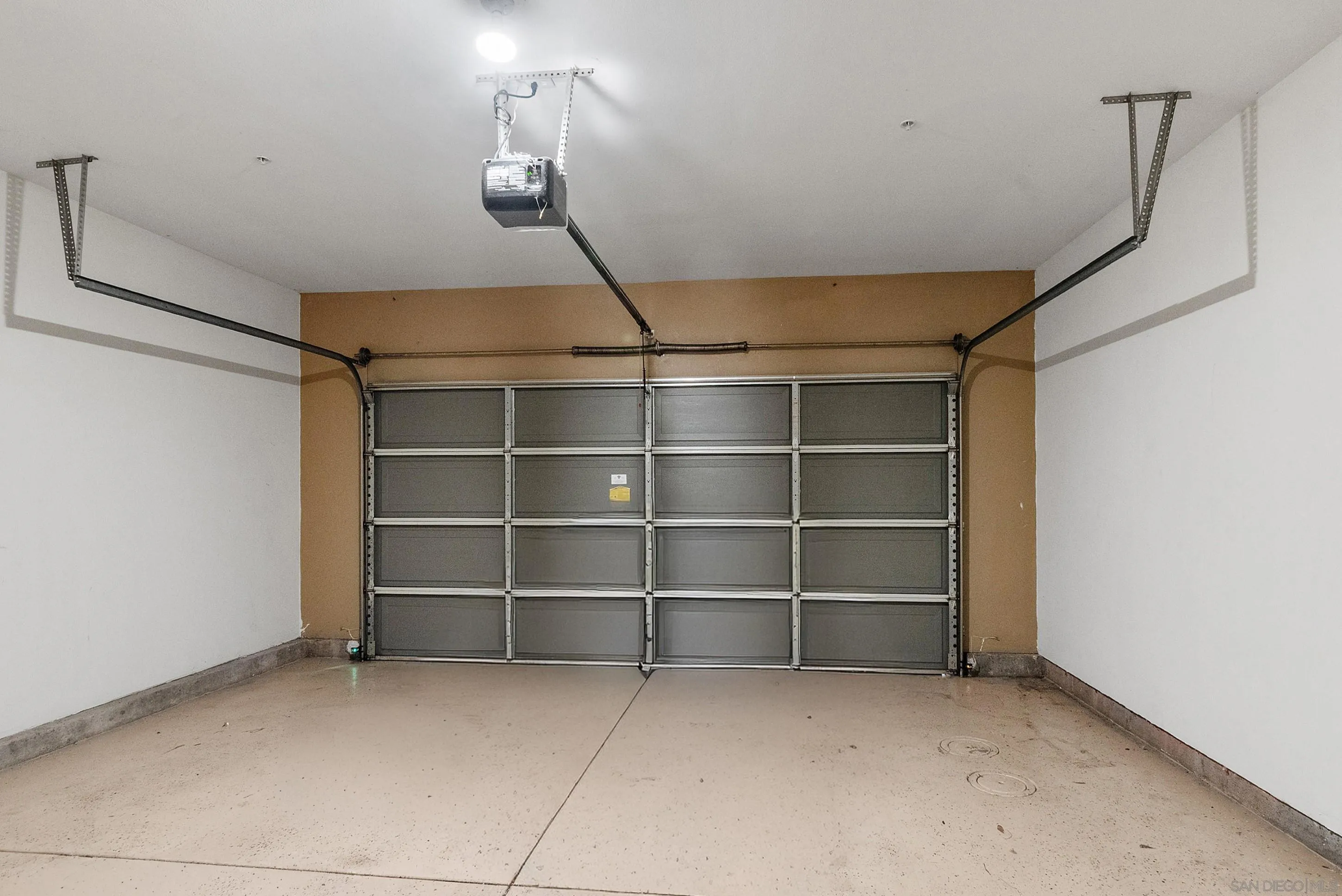 2185 Caminito Rinaldo, Unit 118 Chula Vista, CA 91915 - Photo 25 of 38 a view of an empty room with a empty shelves