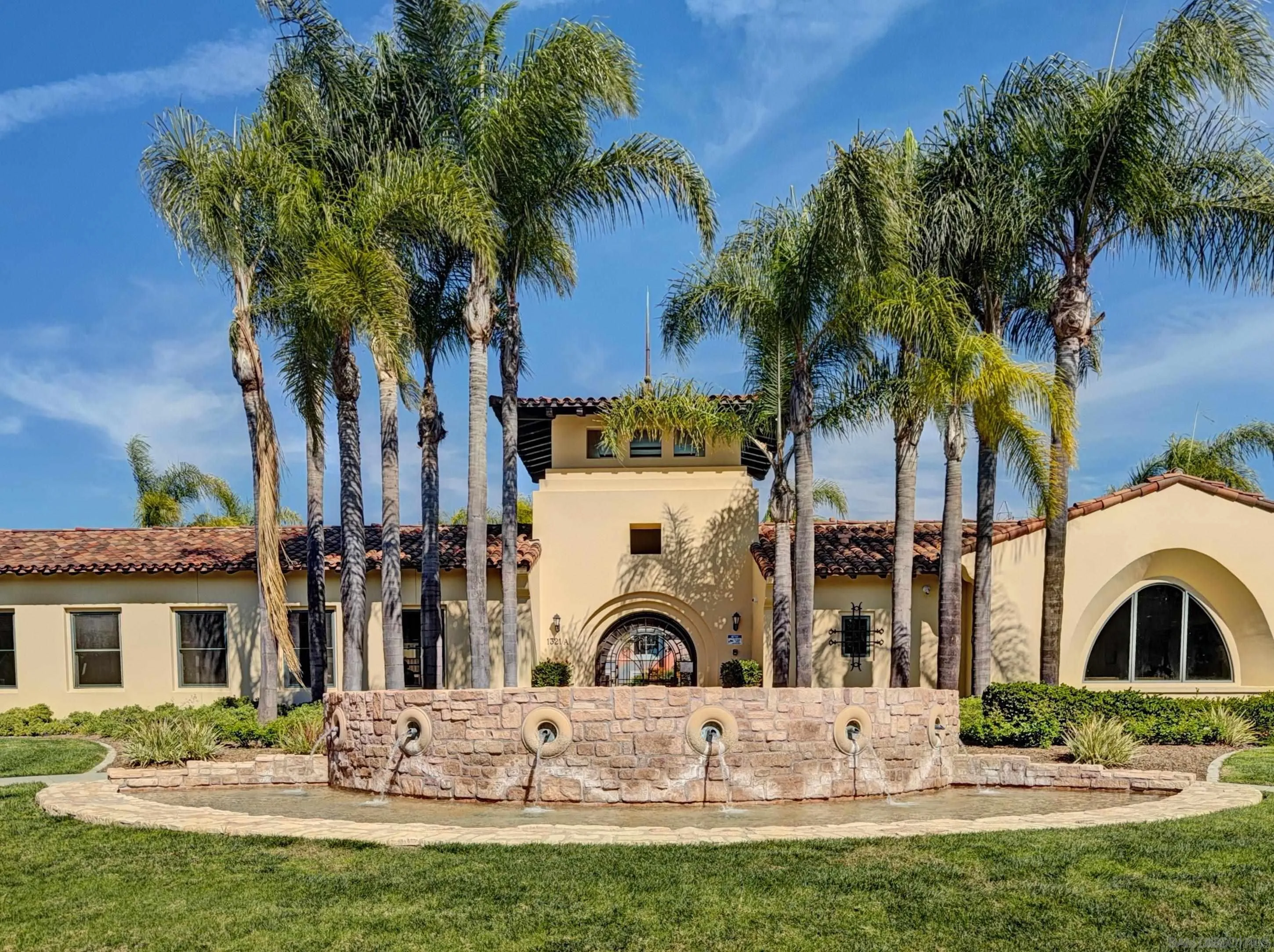 2185 Caminito Rinaldo, Unit 118 Chula Vista, CA 91915 - Photo 28 of 38 a front view of a house with garden