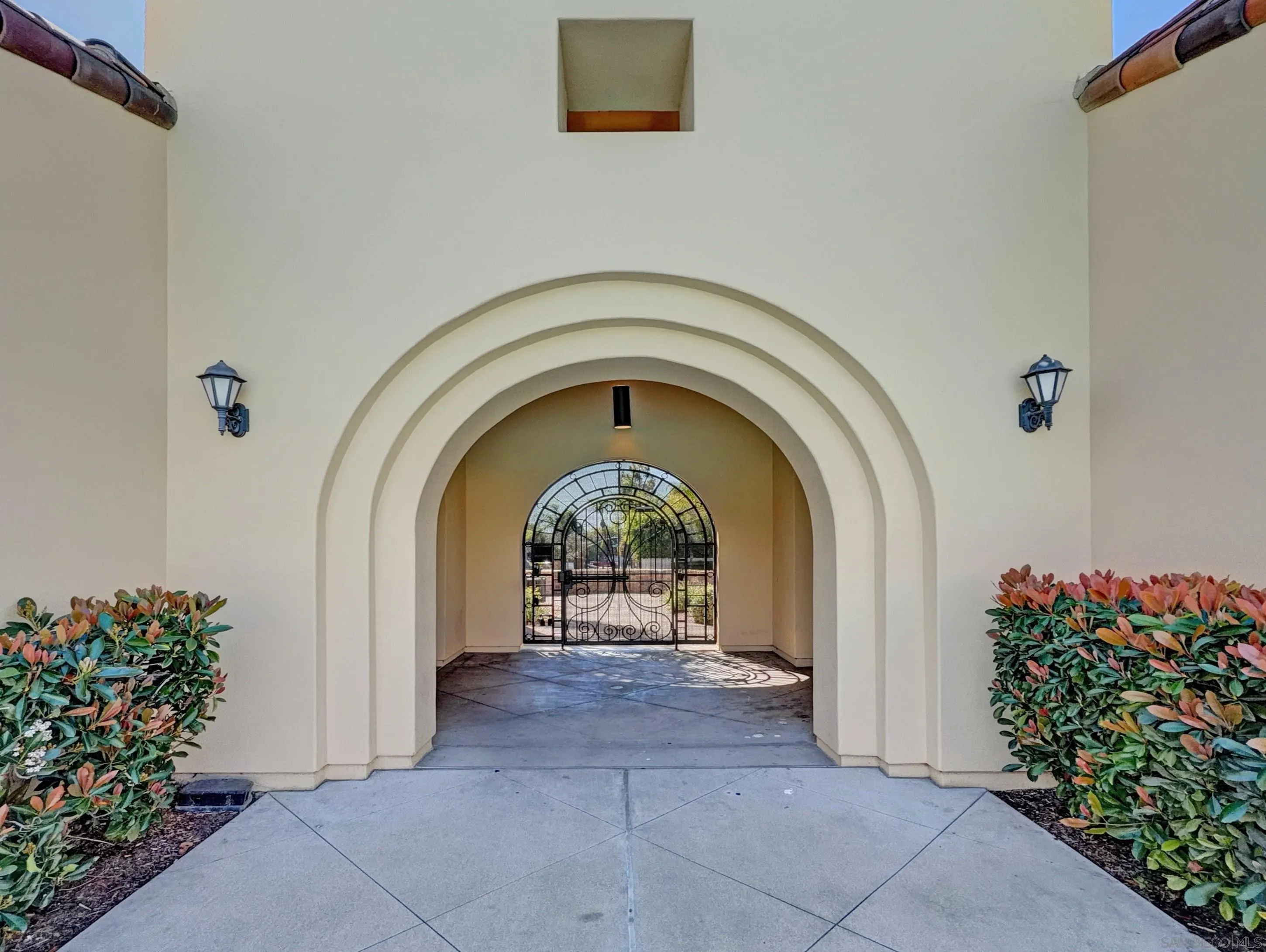 2185 Caminito Rinaldo, Unit 118 Chula Vista, CA 91915 - Photo 29 of 38 a view of entryway with flower pots