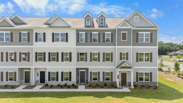 front view of a house with a swimming pool