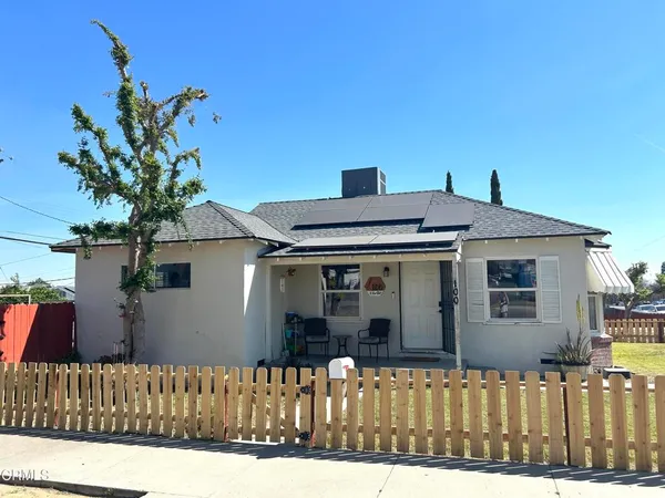 a front view of a house with a garage