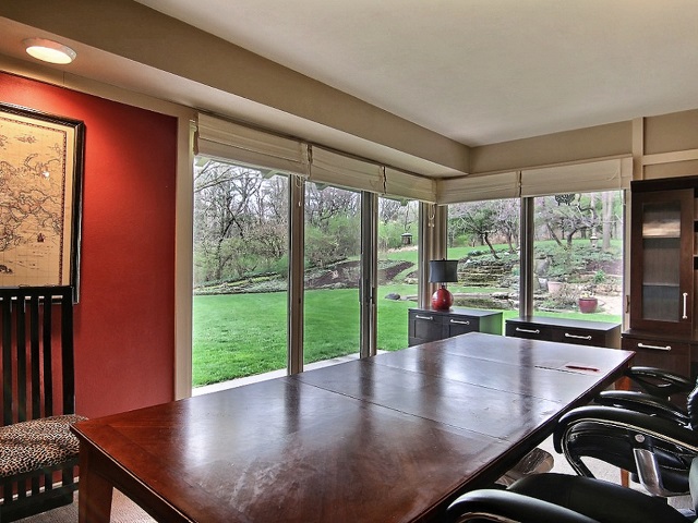 6232 Cunningham Road Rockford, IL 61102 - Photo 17 of 25 a view of a room with furniture and large windows