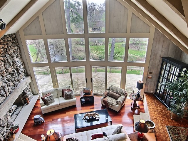 6232 Cunningham Road Rockford, IL 61102 - Photo 5 of 25 a living room with furniture and a large window