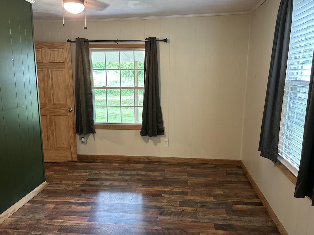 2638 Castleton Road Max Meadows, VA 24360 - Photo 18 of 46 a view of empty room with wooden floor and fan