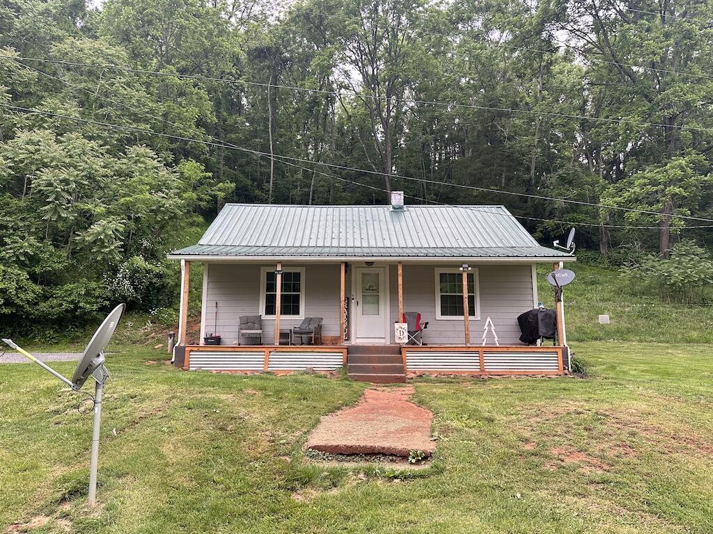 2638 Castleton Road Max Meadows, VA 24360 - Photo 2 of 46 a front view of a house with a yard balcony