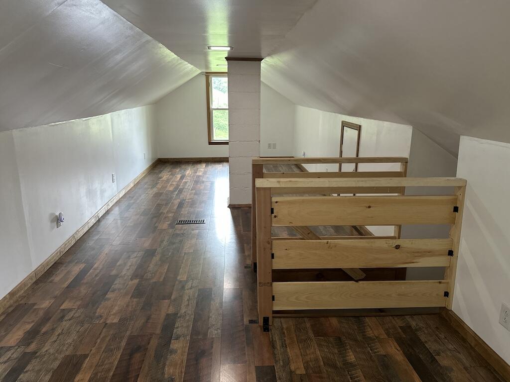 2638 Castleton Road Max Meadows, VA 24360 - Photo 23 of 46 a view of a hallway with wooden floor