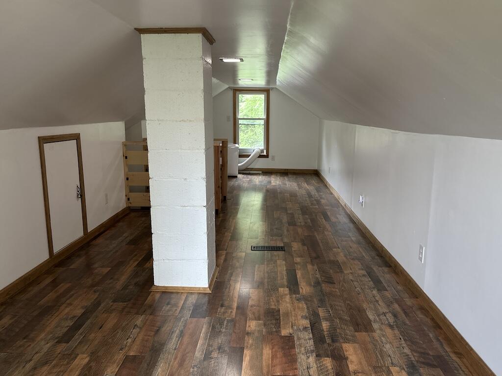 2638 Castleton Road Max Meadows, VA 24360 - Photo 24 of 46 a view of a hallway view with wooden floor and staircase