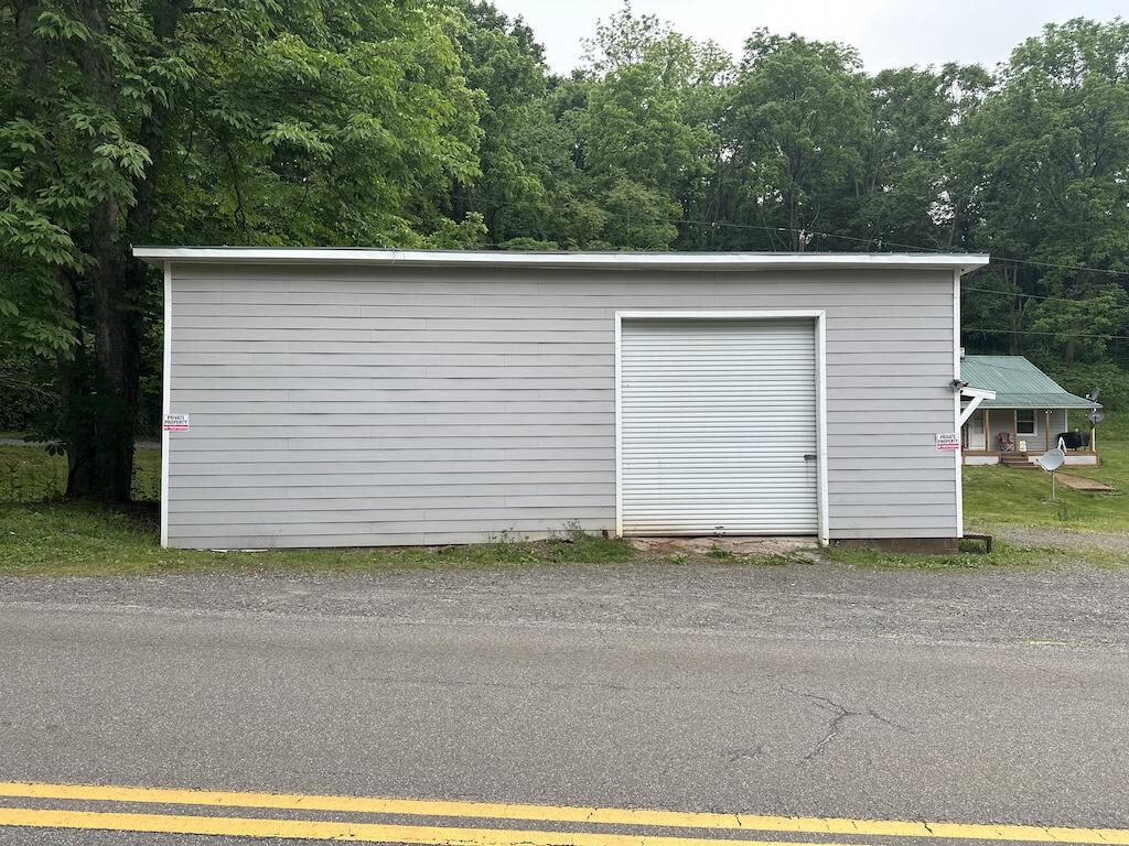 2638 Castleton Road Max Meadows, VA 24360 - Photo 29 of 46 a view of a house with a garage