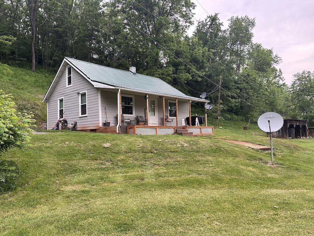 2638 Castleton Road Max Meadows, VA 24360 - Photo 38 of 46 a view of a house with a yard patio and swimming pool
