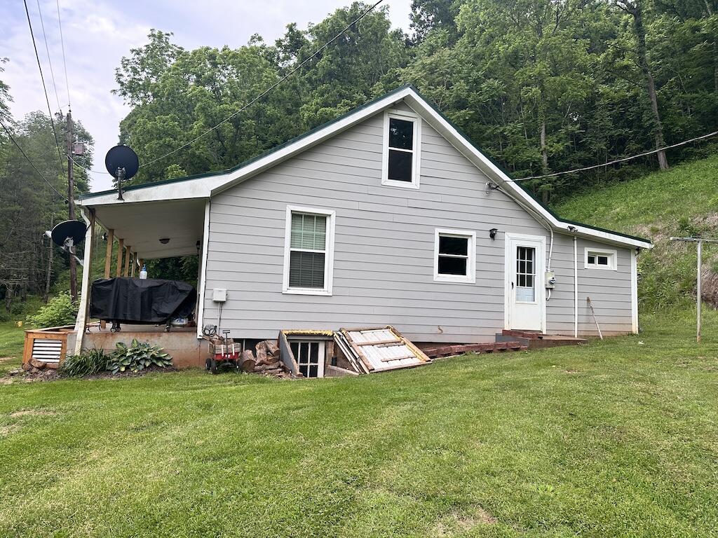 2638 Castleton Road Max Meadows, VA 24360 - Photo 39 of 46 a view of a house with backyard and garden