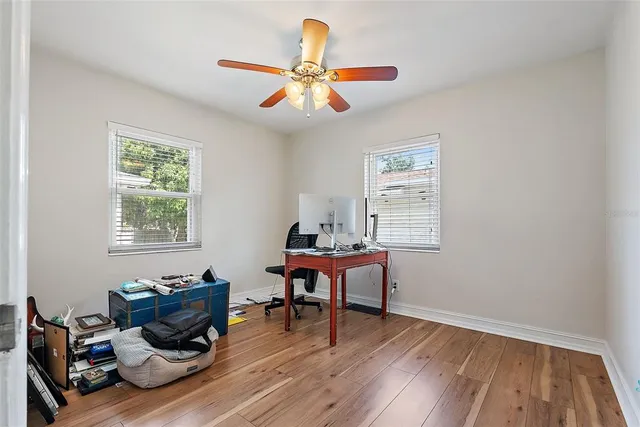 a living room with furniture and a window