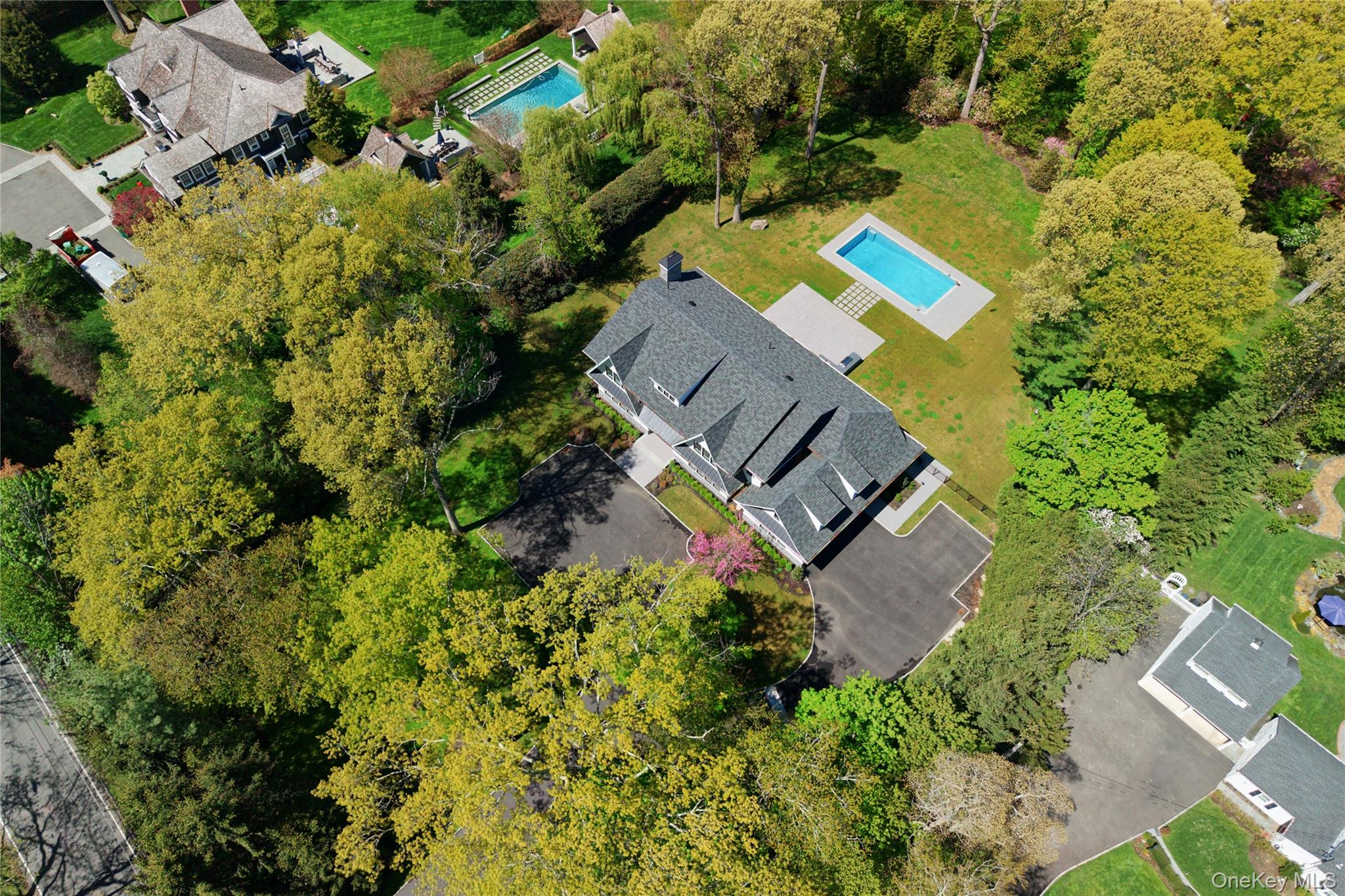 63 Fruitledge Road Glen Head, NY 11545 - Photo 28 of 34 an aerial view of a house with a yard