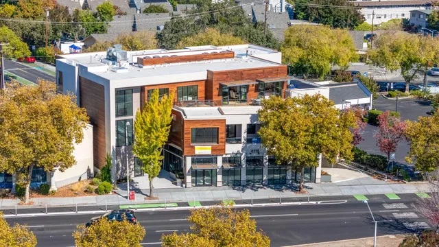 a front view of a building with street view