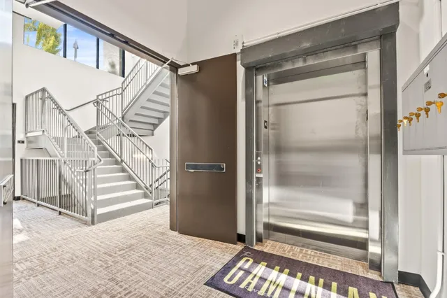 a view of entryway with a front door