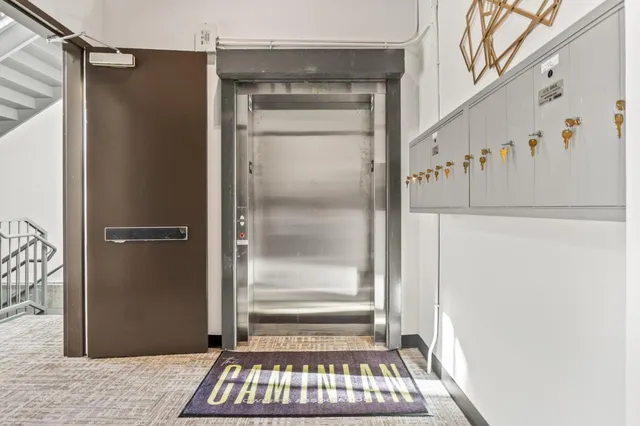 a view of an entryway with a door