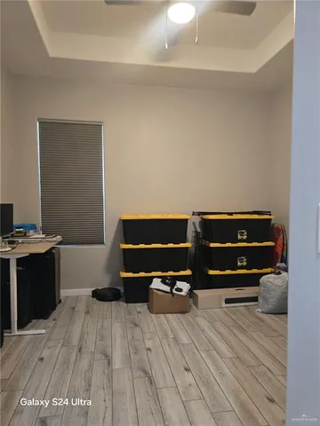 a view of outdoor space with wooden floor