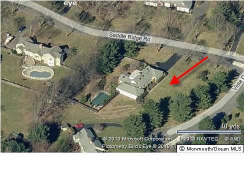 7 Saddle Ridge Road Colts Neck, NJ 07722 - Photo 2 of 3 an aerial view of a house