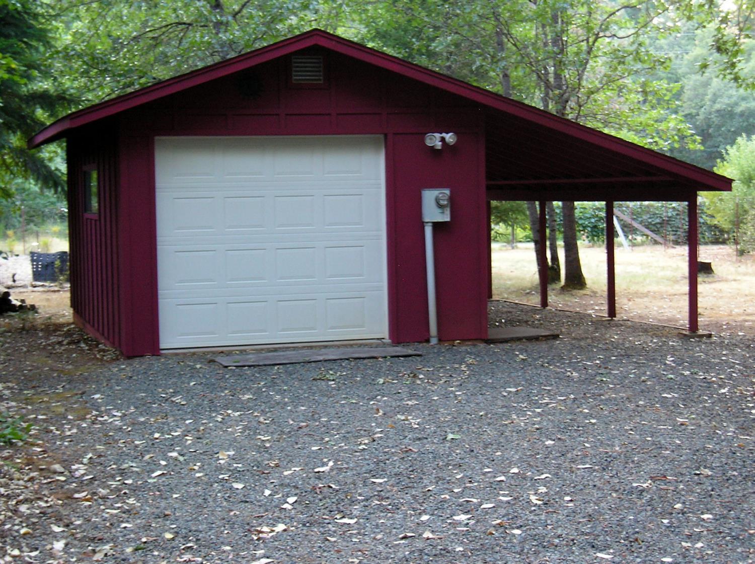 435 South Old Stage Road Cave Junction, OR 97523 - Photo 19 of 22 detached shop has concrete floor, 8' doo