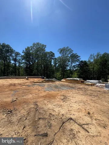 a front view of a house with parking
