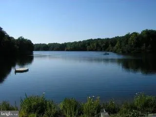a backyard of a house with seating space