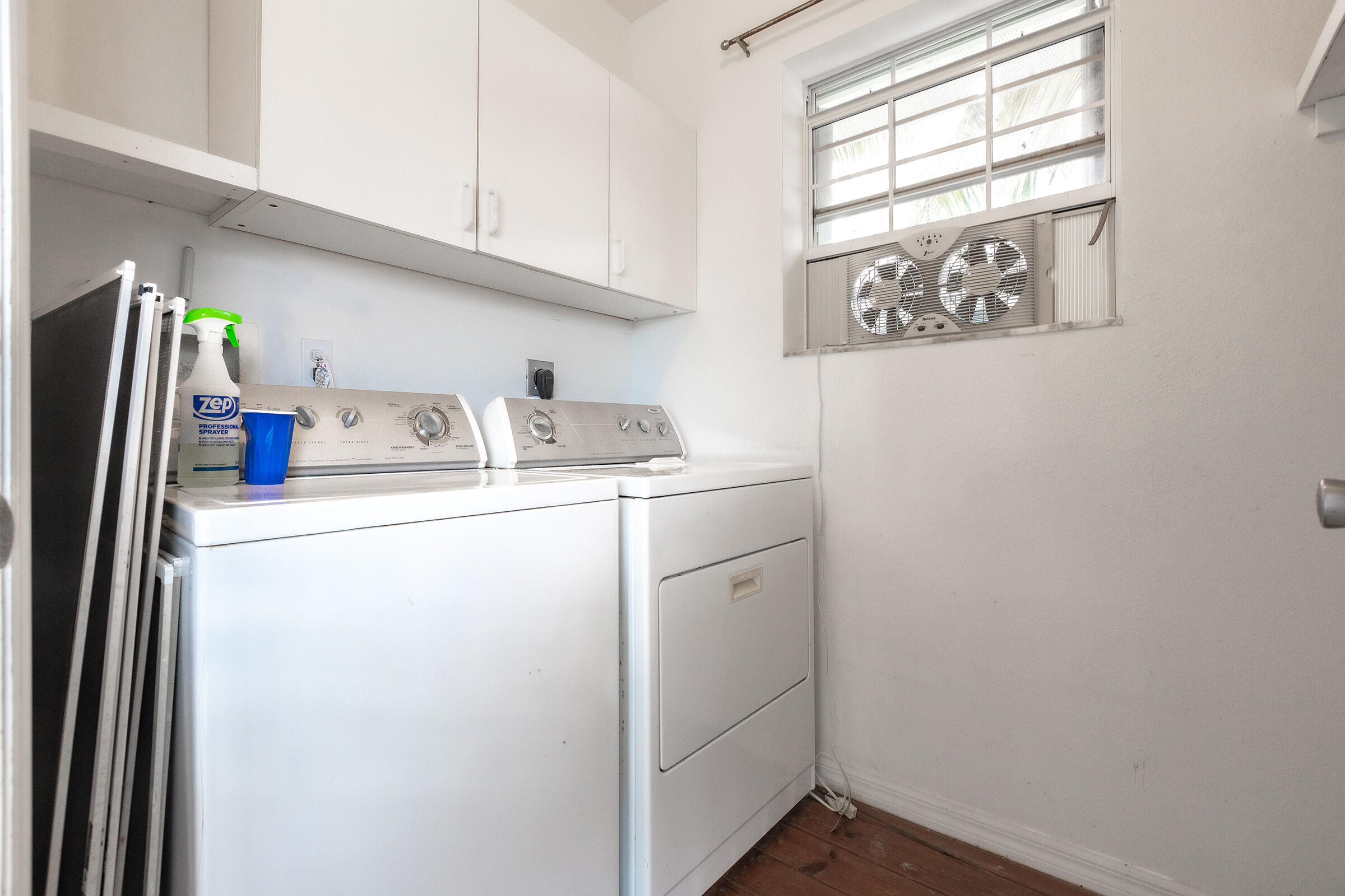 22808 Privateer Drive Cudjoe, FL 33042 - Photo 18 of 28 a utility room with dryer and washer